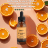 Bottle of Vitamin C Serum designed to brighten dark spots and boost collagen for glowing skin.